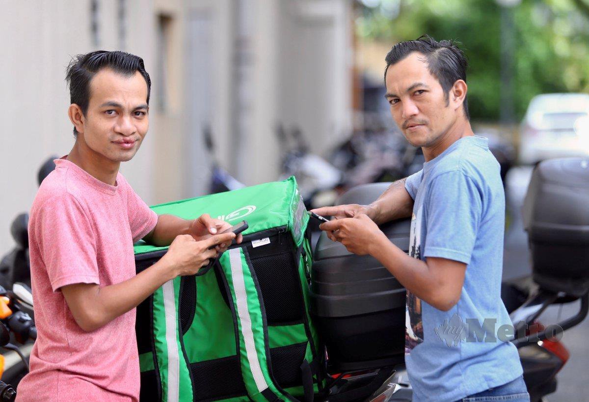 AMIRUL Hafizan (kanan) bersama Mohamad Syafiq. FOTO Fathil Asri